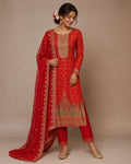 RED BEAUTY IN BANARSI SUIT WITH WORK ON NECK LINE AN STRAIGHT PANT
