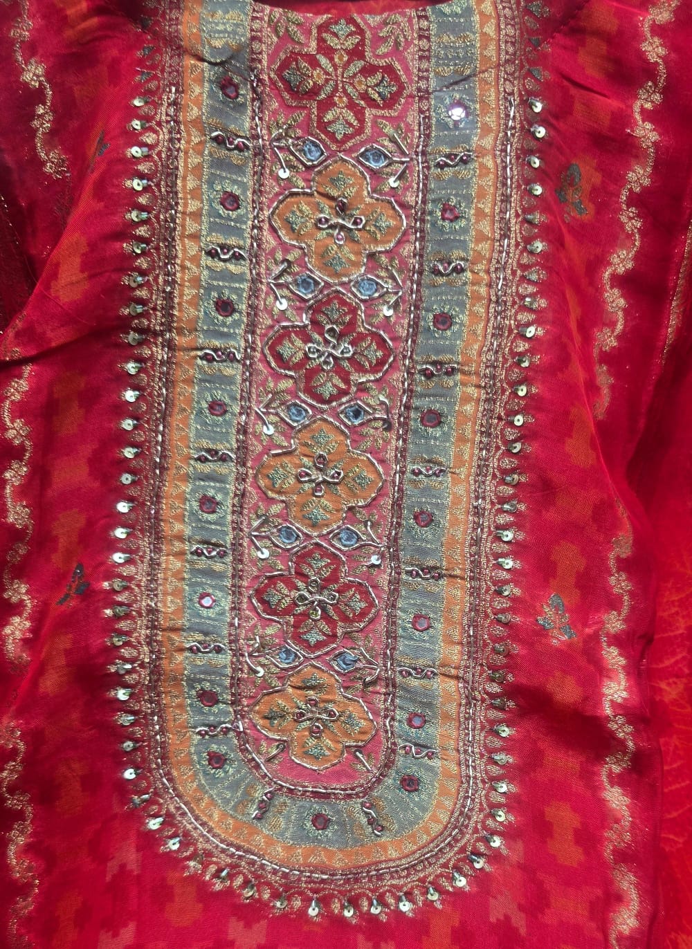 RED BEAUTY IN BANARSI SUIT WITH WORK ON NECK LINE AN STRAIGHT PANT