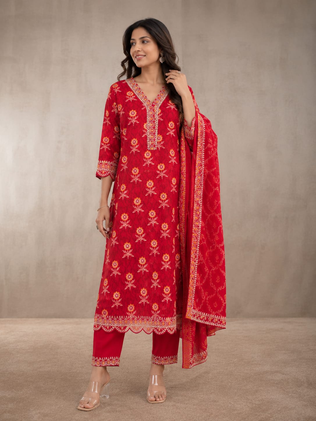 RED PRINTED MUSLIN SUIT WITH EMBROIDERY ON NECKLINE AND HEMLINE  BOTTOM WITH EMBROIDERY  PURE CHINNON PRINTED DUPATTA WITH FOUR SIDE SCALPING