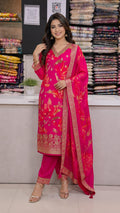 MAJENTA PINK  FLORAL PRINT BANARSI SUIT  WITH WORK ON NECK LINE AND HEMLINE