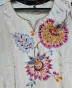 OFFWHITE  COLOUR PURE CREPE  SUIT  WITH FLORAL EMBROIDERY  WITY SEQUENCE AND MIRROR WORK