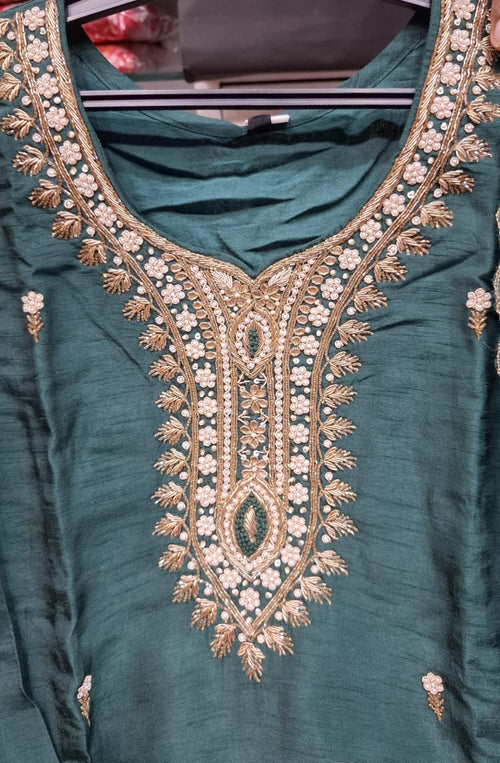 BOTTLE GREEN COLOUR DOLA SILK SUIT WITH HEAVY EMBROIDERY  OF MOTI AND DAPKA WORK ON NECK AND SMALL FLOWERS ON FULL SUIT
