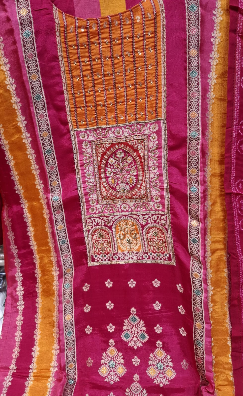 PINK AND ORANGE BANARSI FABRIC  SUIT WITH  WORK ON FULL PANNEL
