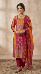 PINK AND ORANGE BANARSI FABRIC  SUIT WITH  WORK ON FULL PANNEL