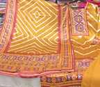 Mustard Gajji Silk elegance with vibrant traditional prints