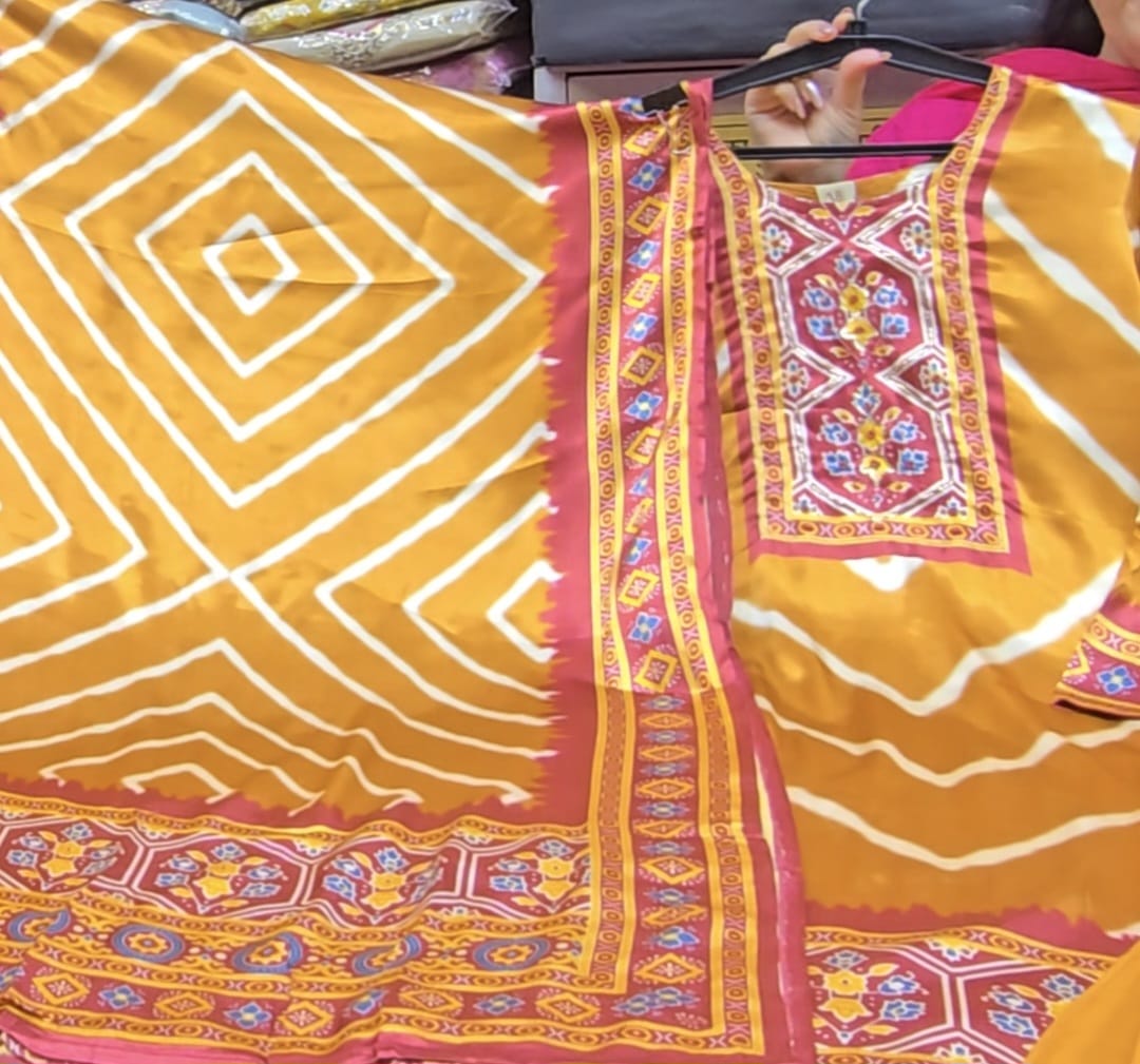 Mustard Gajji Silk elegance with vibrant traditional prints