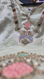 Elegant Mauve Chinnon Suit with Anquisite Moti Work